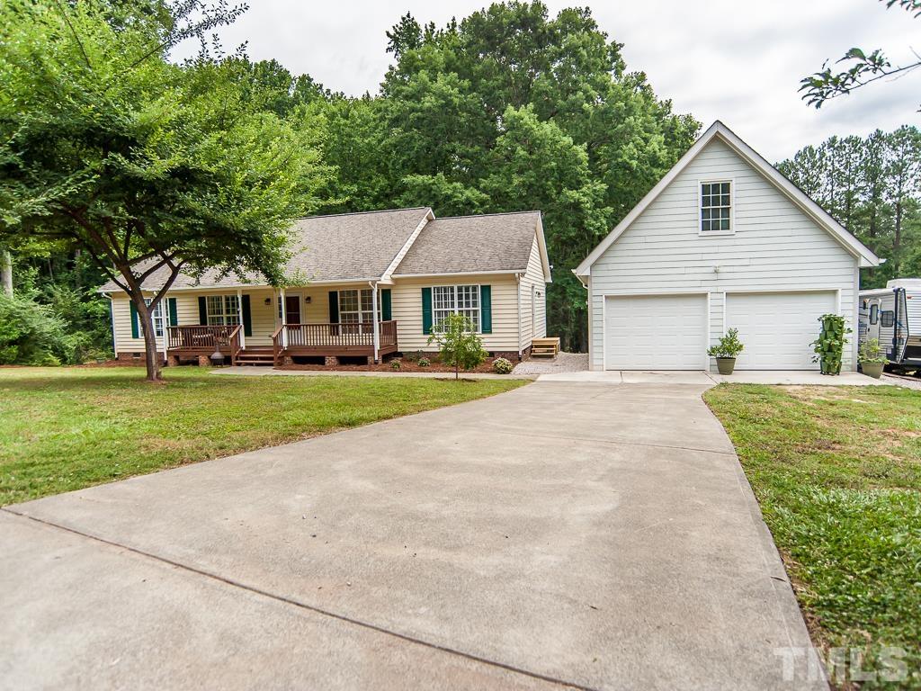 4900 Raytown Road Raleigh, NC 27613 - Photo 3 of 34 a view of house with yard