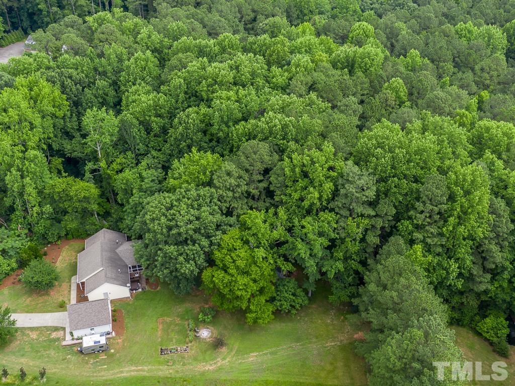 4900 Raytown Road Raleigh, NC 27613 - Photo 34 of 34 a water view of a house with a yard garage and sitting area