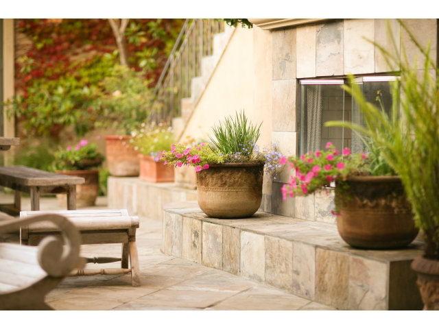 401 Estrella Doro Monterey, CA 93940 - Photo 17 of 25 a dining room with furniture and a potted plant