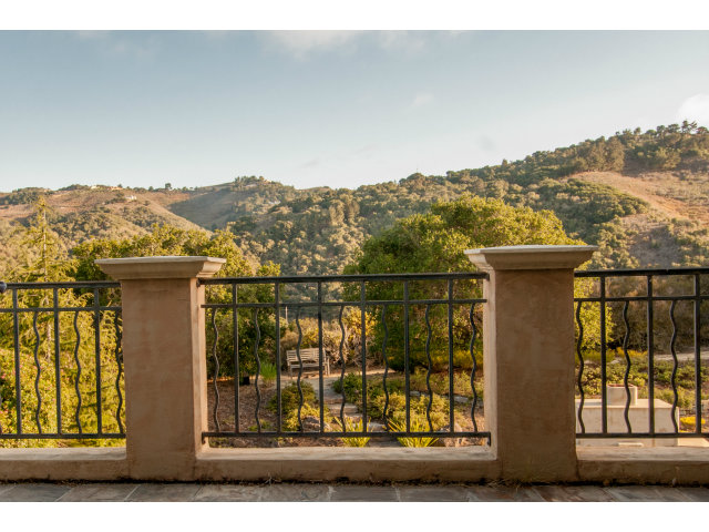 401 Estrella Doro Monterey, CA 93940 - Photo 18 of 25 a view of a house with a window and a yard