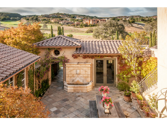 401 Estrella Doro Monterey, CA 93940 - Photo 20 of 25 a front view of a house with a yard