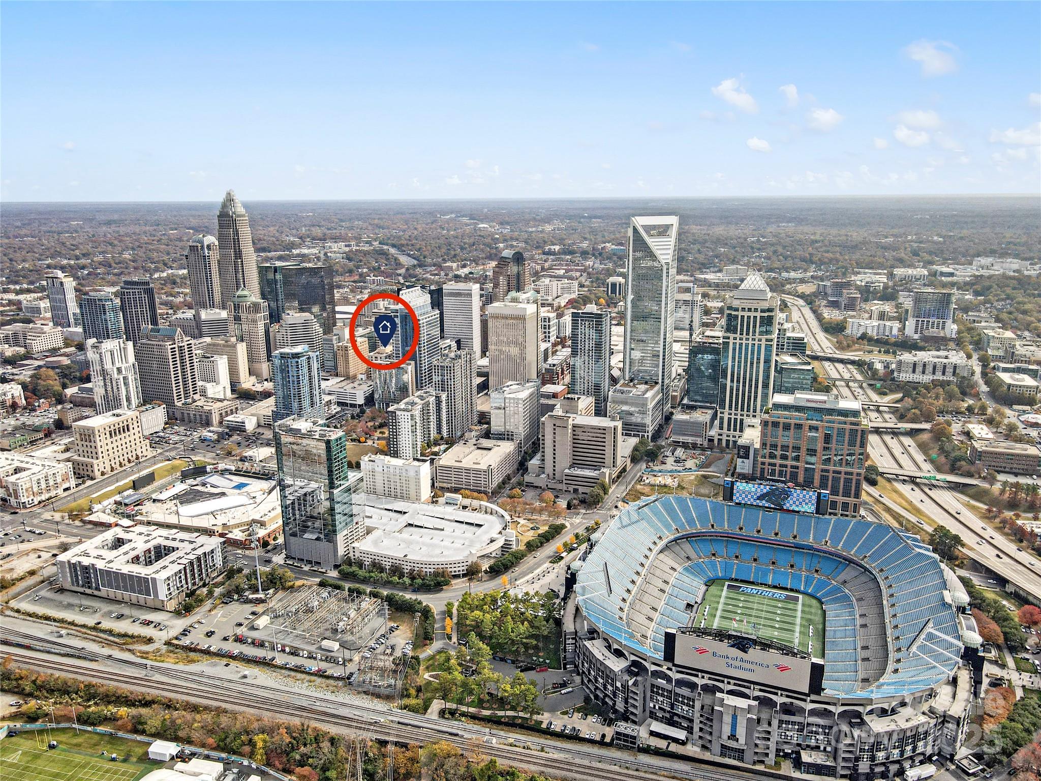 230 South Tryon Street, Unit 603 Charlotte, NC 28281 - Photo 1 of 32 an aerial view of a city with lot of buildings