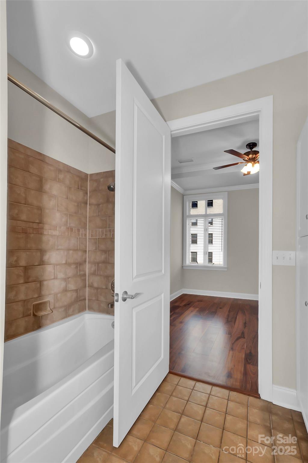 230 South Tryon Street, Unit 603 Charlotte, NC 28281 - Photo 28 of 32 a view of bathroom with bathtub and shower