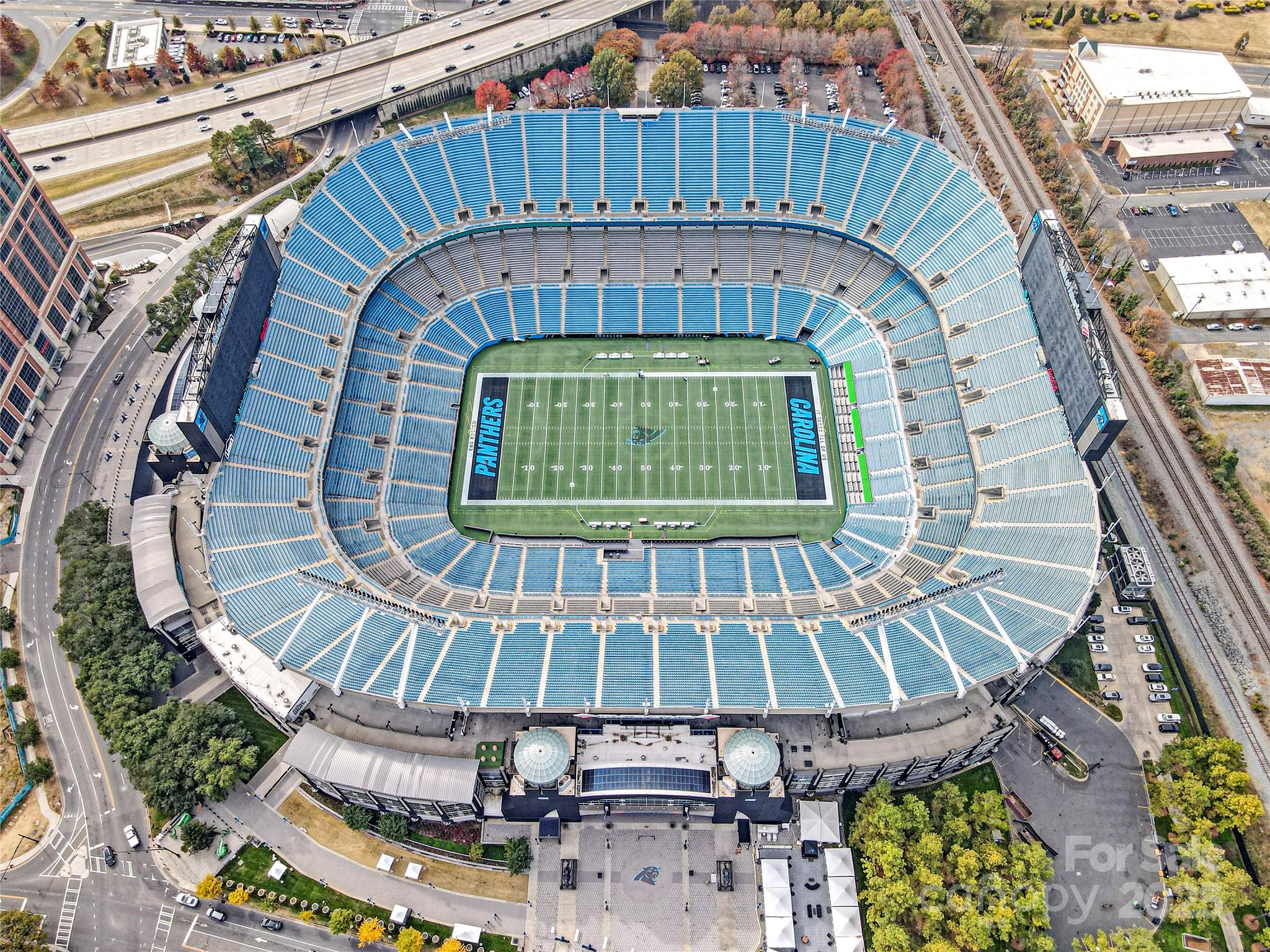 230 South Tryon Street, Unit 603 Charlotte, NC 28281 - Photo 3 of 32 an aerial view of a house with a swimming pool
