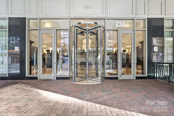 a view of a lobby with gym equipment
