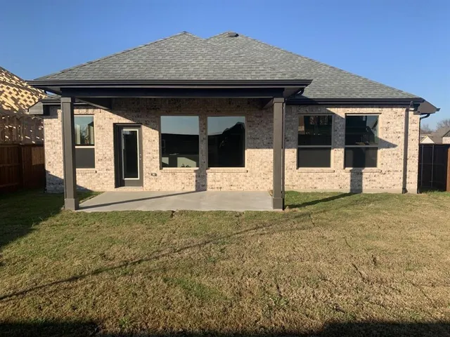 a view of a house with large outdoor space