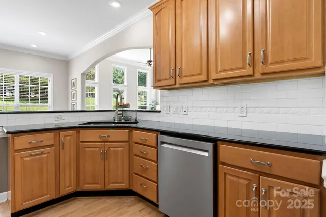 a kitchen that has a sink and a window