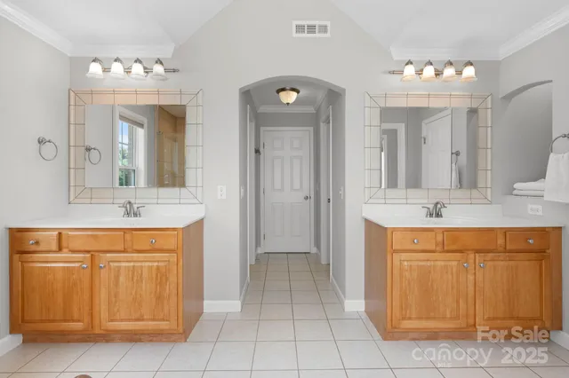 a bathroom with a sink a counter and a mirror