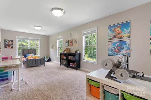 a view of room with workspace and music instruments
