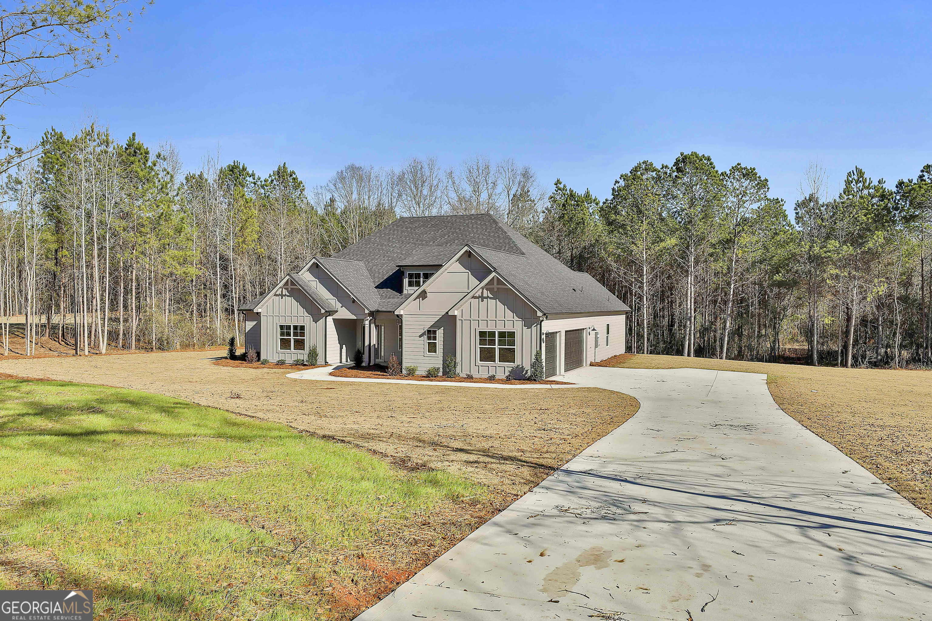 757 Alex Stephens Road Moreland, GA 30259 - Photo 3 of 45 a front view of a house with a yard and trees