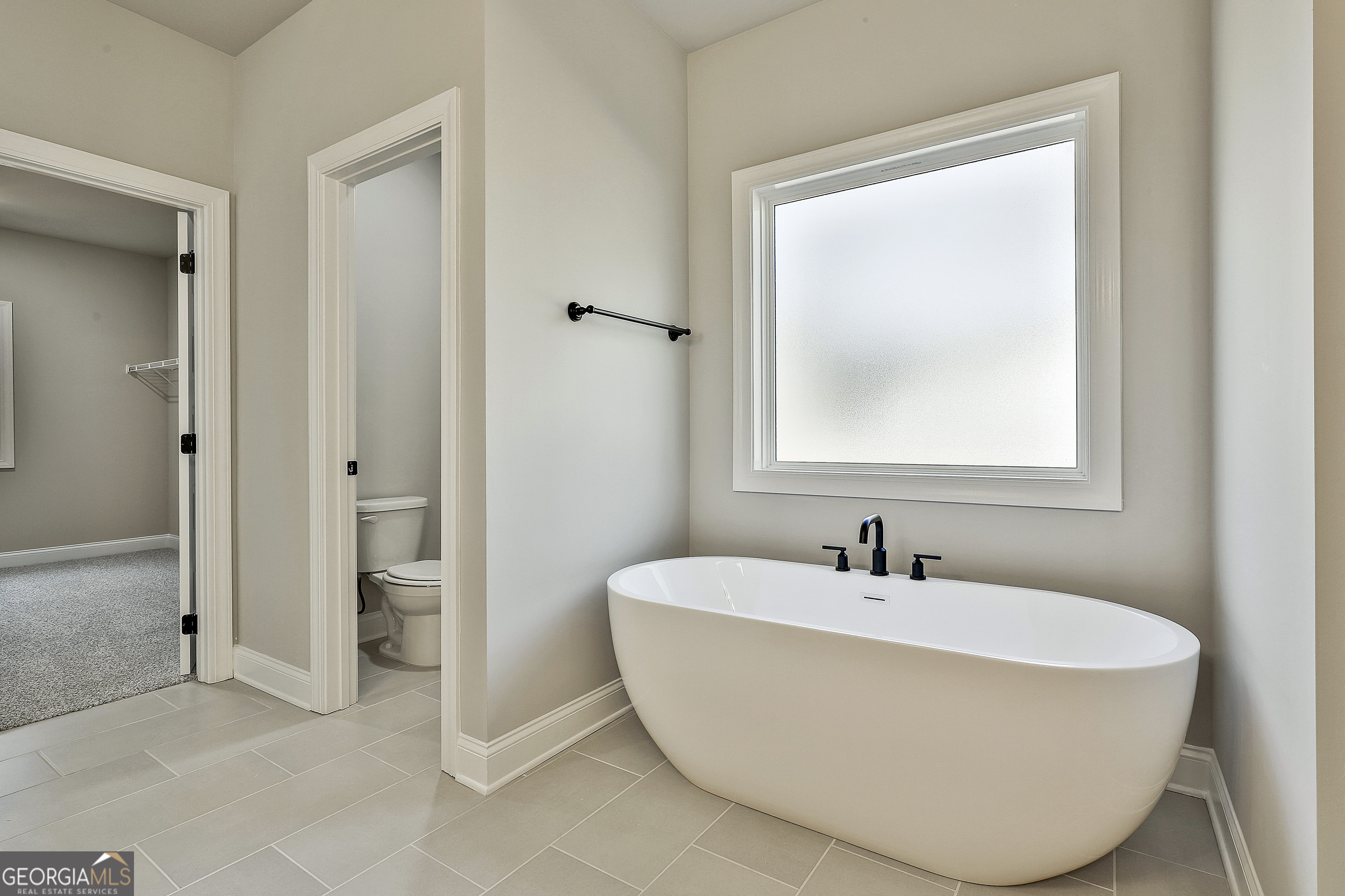 757 Alex Stephens Road Moreland, GA 30259 - Photo 39 of 45 a bathroom with a sink and a mirror