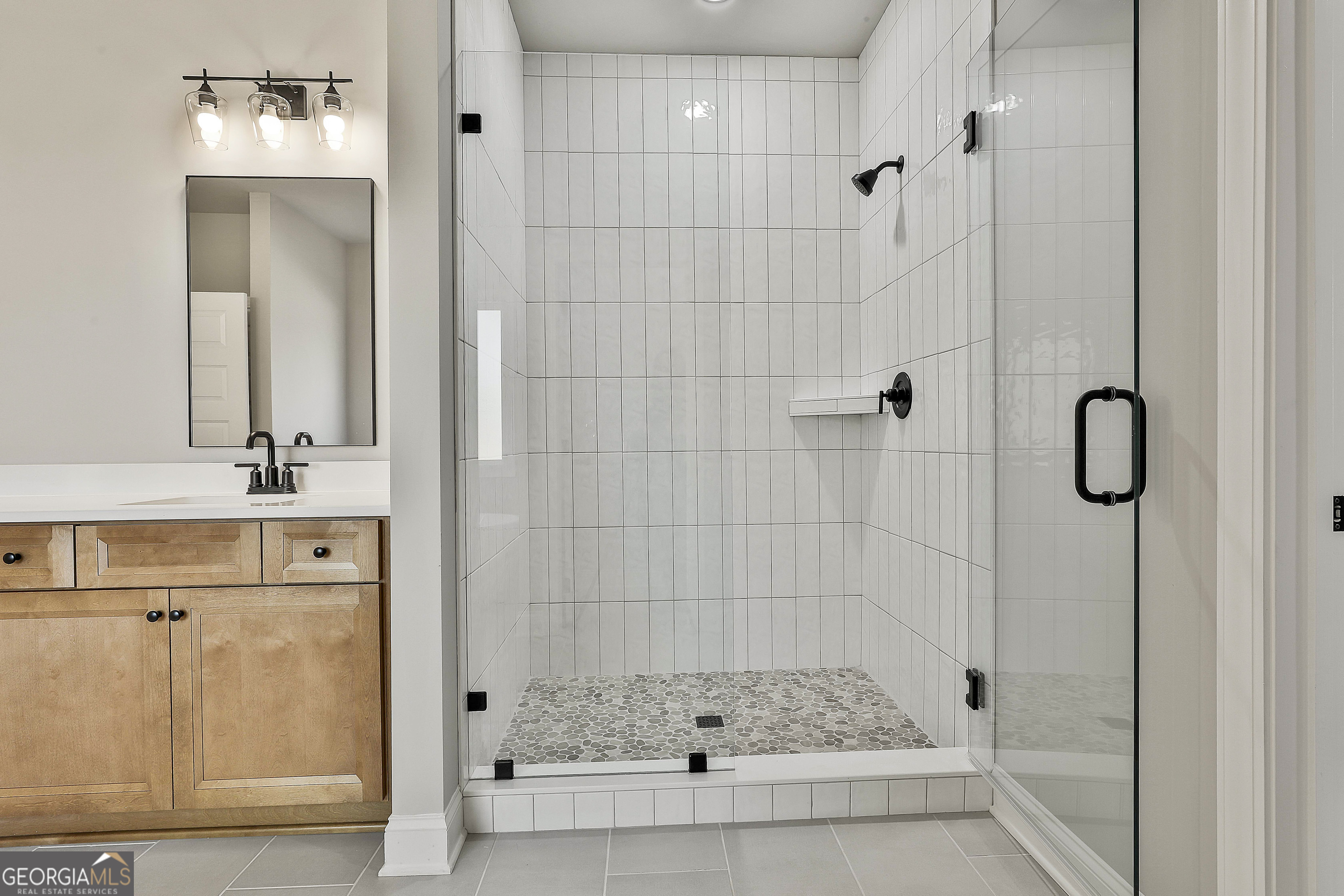 757 Alex Stephens Road Moreland, GA 30259 - Photo 40 of 45 a bathroom with a shower and a sink