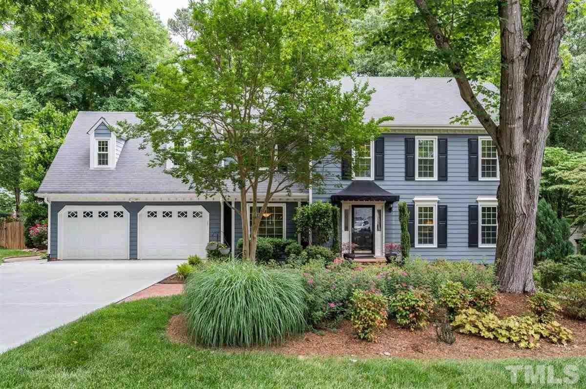 7916 Sutterton Court Raleigh, NC 27615 - Photo 1 of 25 front view of a house with a yard