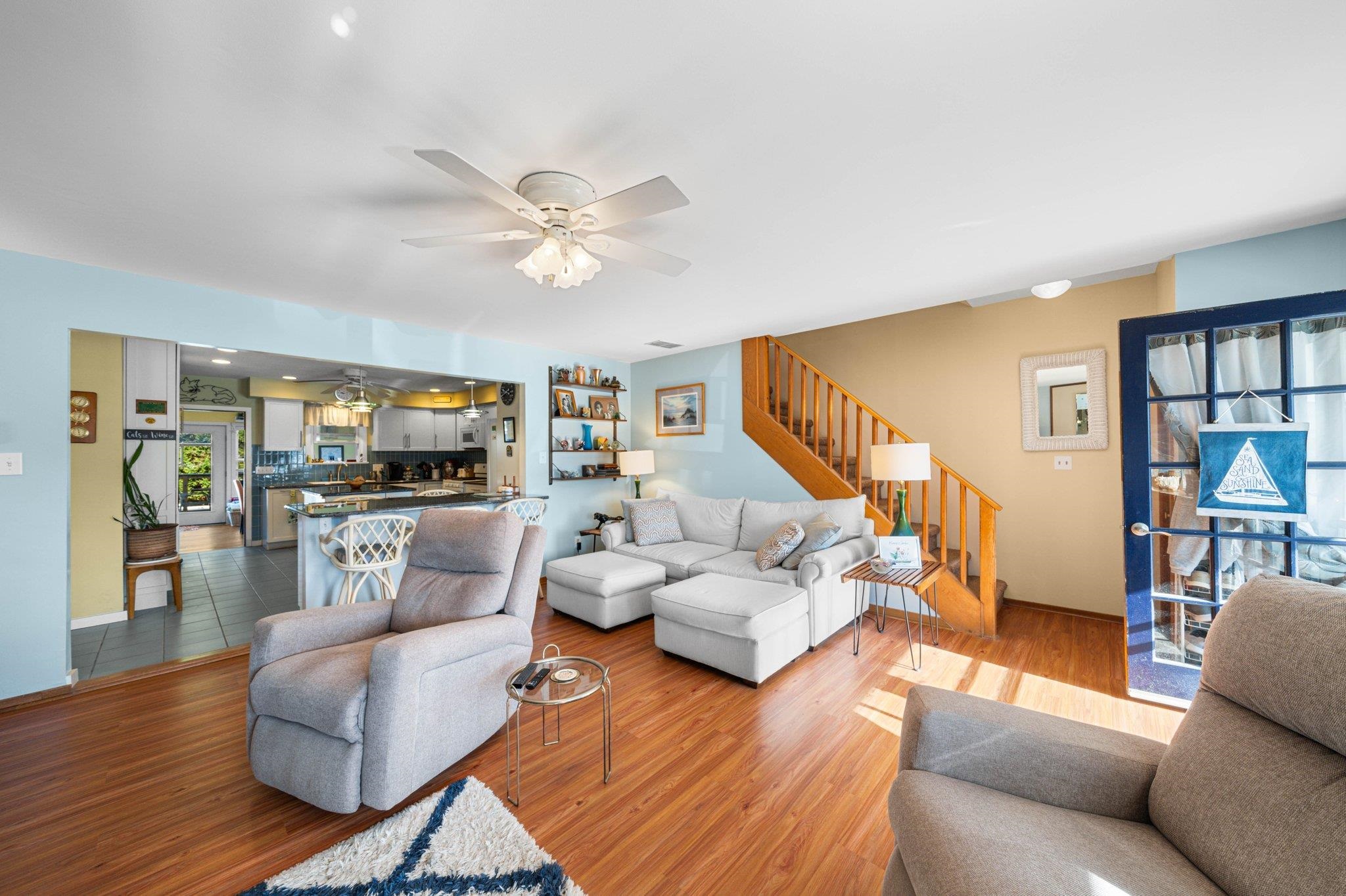 2754 1st Avalon, NJ 08202 - Photo 10 of 26 a living room with furniture kitchen view and a wooden floor