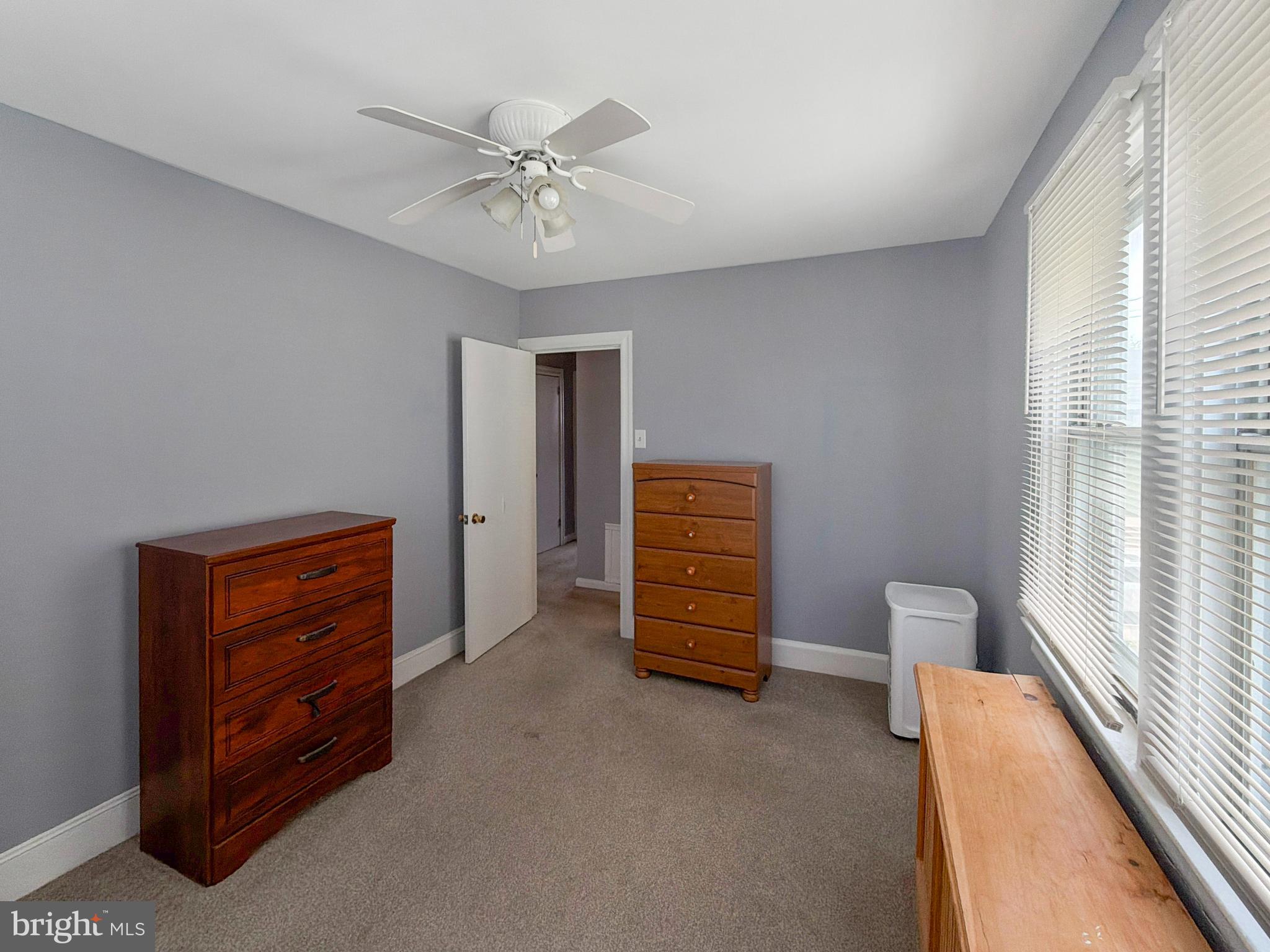 1213 Harding Drive Havertown, PA 19083 - Photo 20 of 25 a view of room with furniture and a ceiling fan