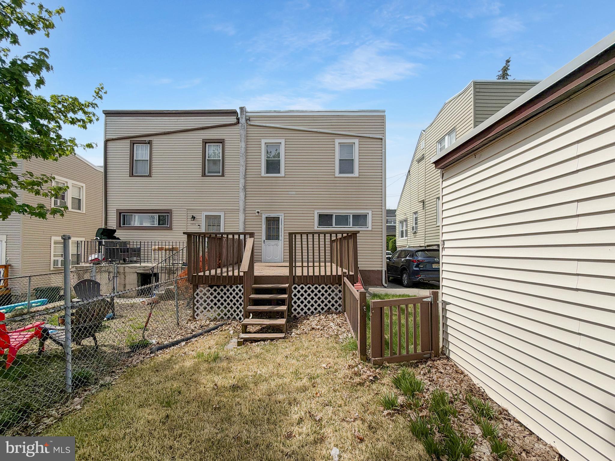 1213 Harding Drive Havertown, PA 19083 - Photo 21 of 25 a backyard of a house with barbeque oven table and chairs