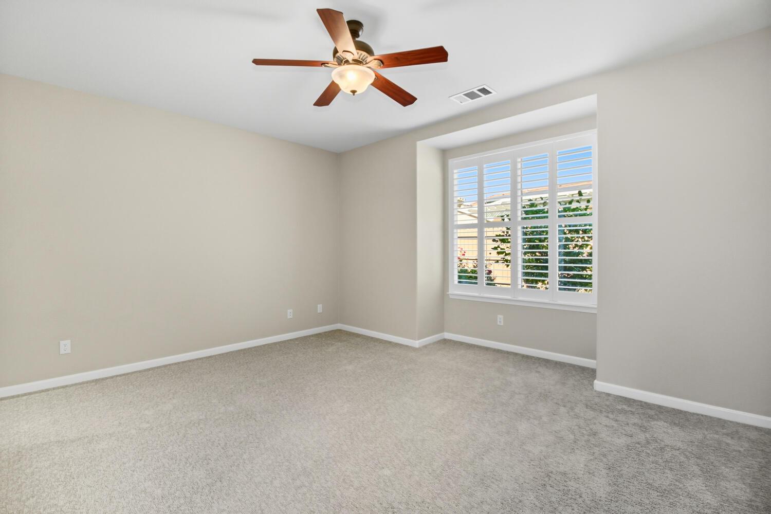 7409 Rothschild Court Elk Grove, CA 95757 - Photo 22 of 62 a view of an empty room with a window