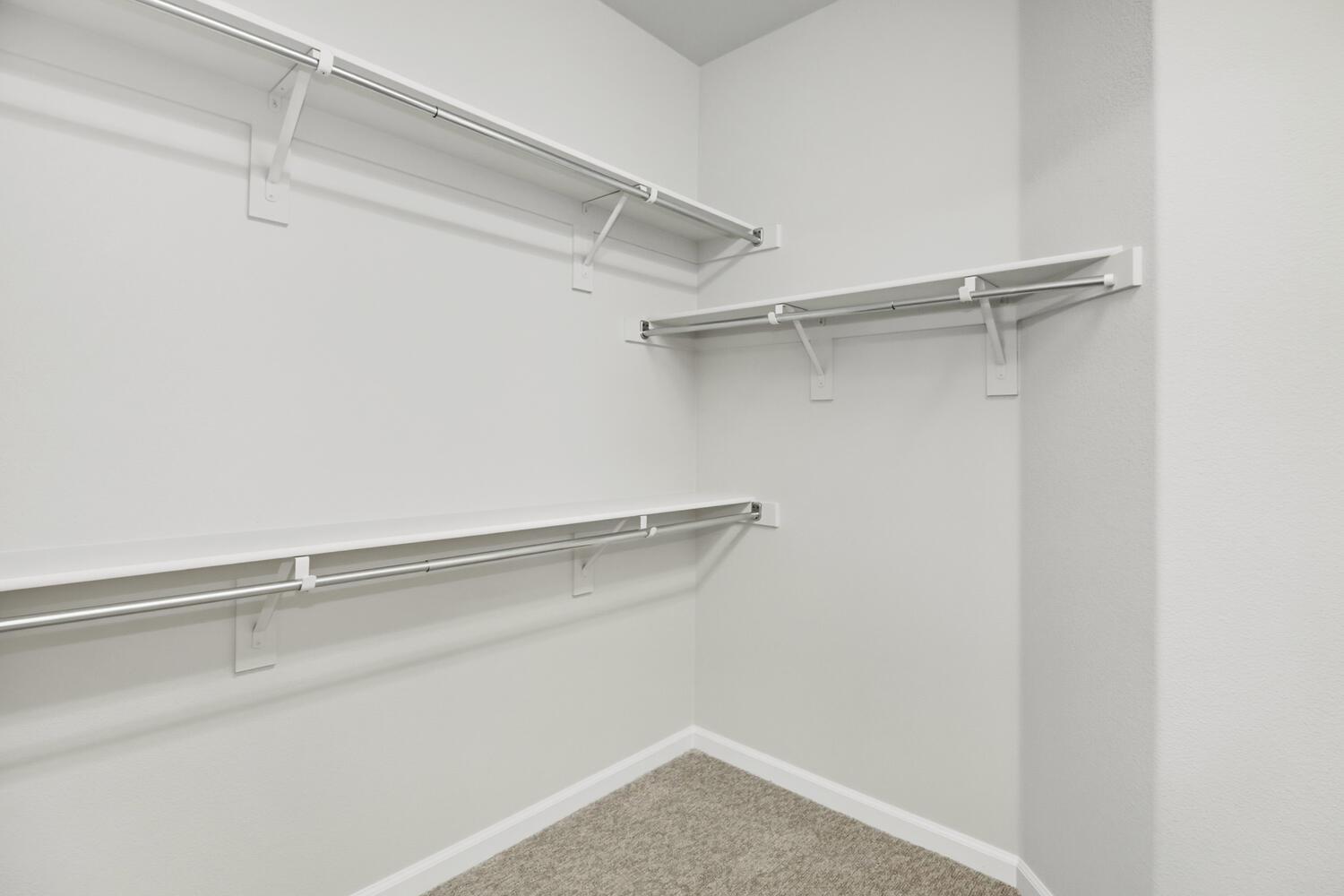 7409 Rothschild Court Elk Grove, CA 95757 - Photo 27 of 62 a view of a room with racks on the wall