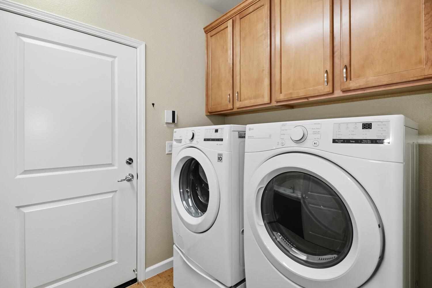 7409 Rothschild Court Elk Grove, CA 95757 - Photo 34 of 62 a utility room with dryer and washer