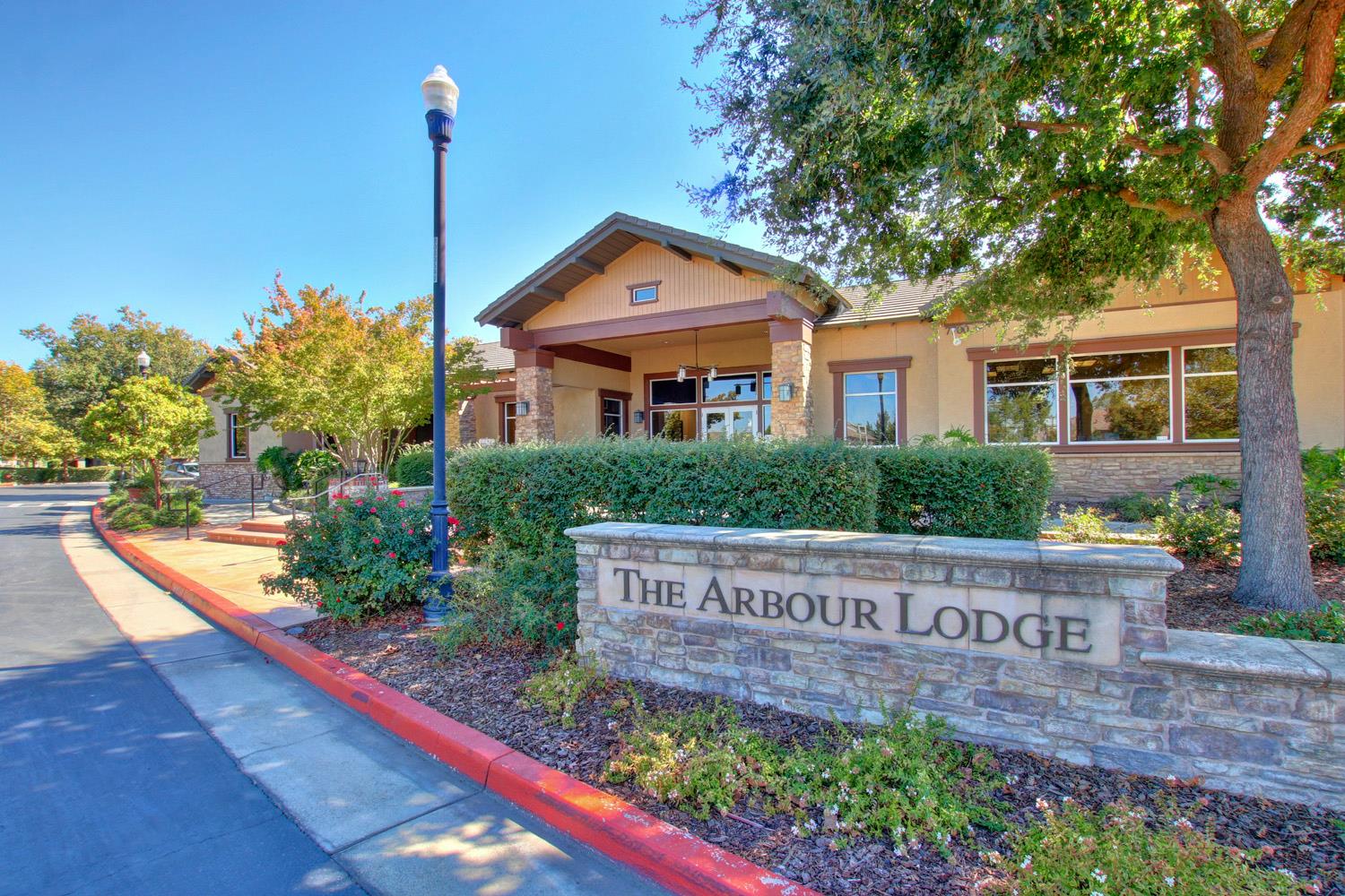 7409 Rothschild Court Elk Grove, CA 95757 - Photo 46 of 62 a view of front of house with a sign board