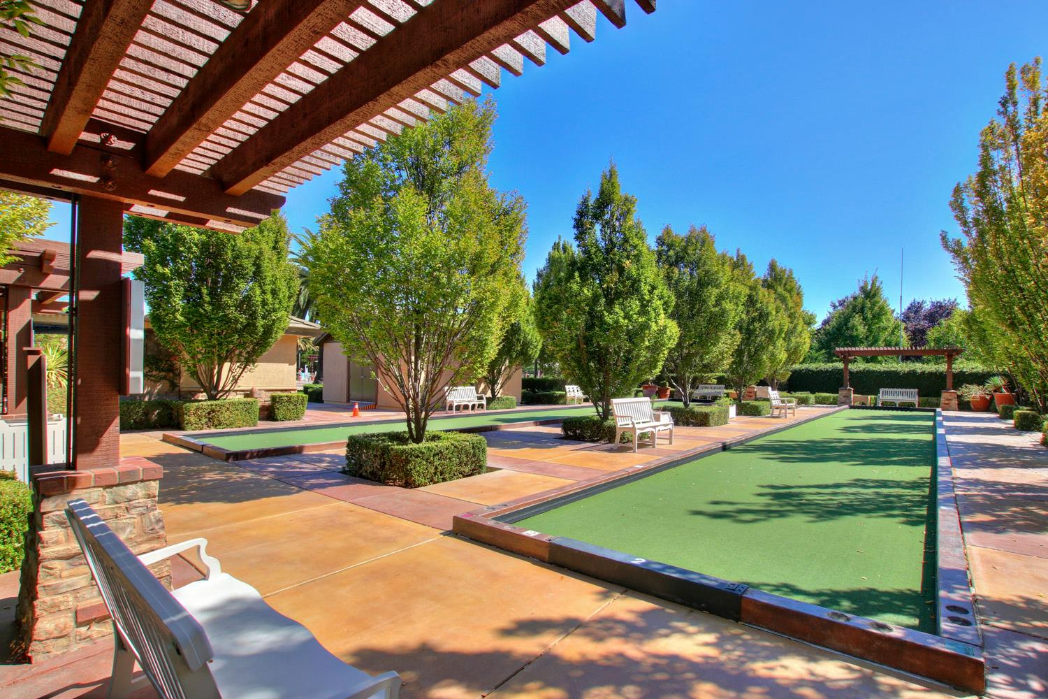 7409 Rothschild Court Elk Grove, CA 95757 - Photo 60 of 62 a view of a backyard with swimming pool
