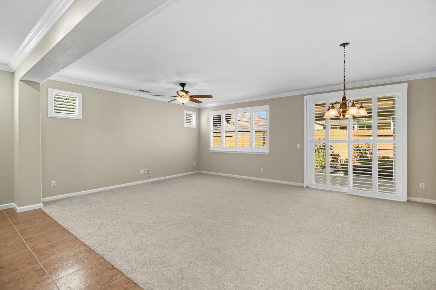 7409 Rothschild Court Elk Grove, CA 95757 - Photo 8 of 62 a view of an empty room with a window
