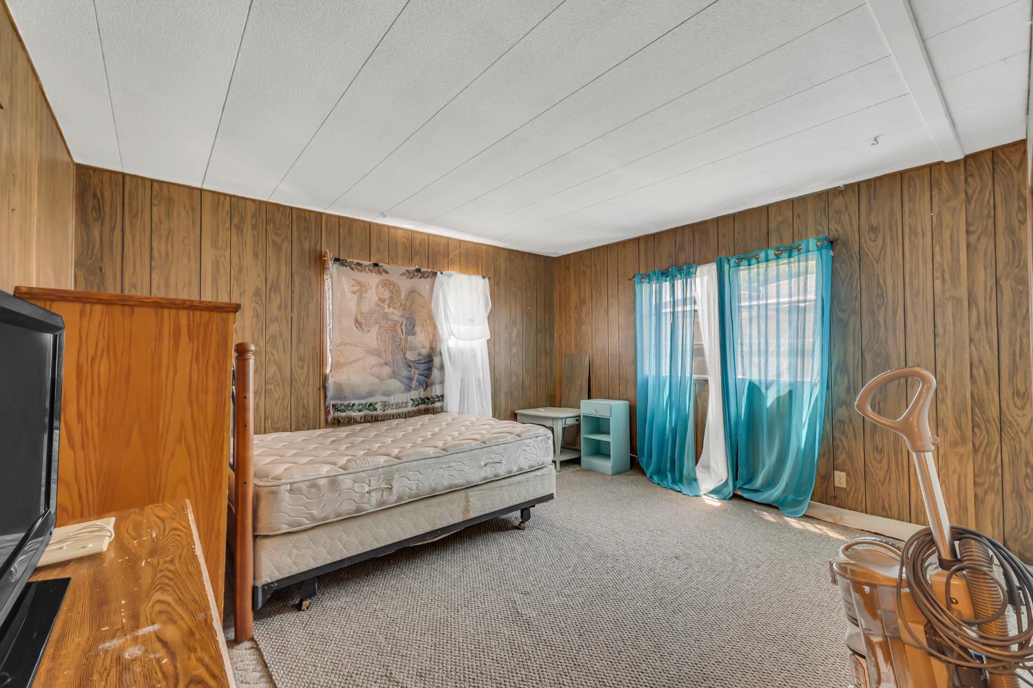 3901 Lake Road, Unit 92 West Sacramento, CA 95691 - Photo 15 of 26 a bedroom with a bed and a window