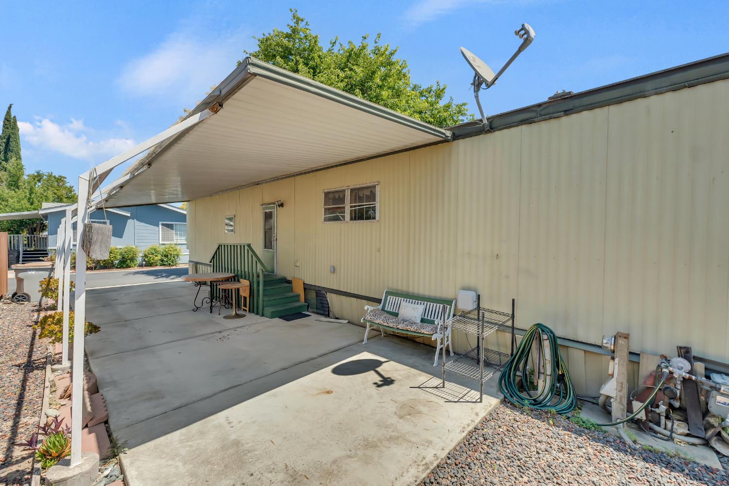 3901 Lake Road, Unit 92 West Sacramento, CA 95691 - Photo 26 of 26 a backyard of a house with table and chairs