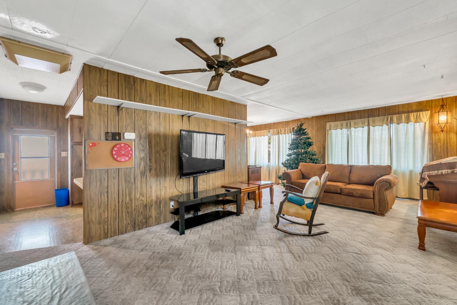 3901 Lake Road, Unit 92 West Sacramento, CA 95691 - Photo 9 of 26 a living room with furniture and a flat screen tv