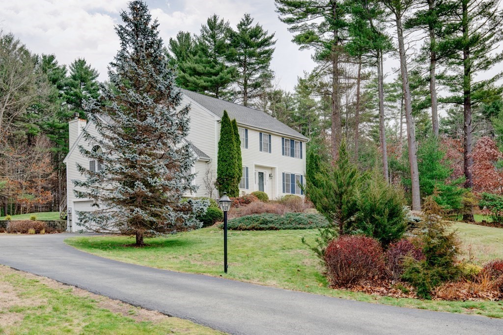 97 Weldon Farm Road Rowley, MA 01969 - Photo 3 of 37 a front view of house with yard and green space