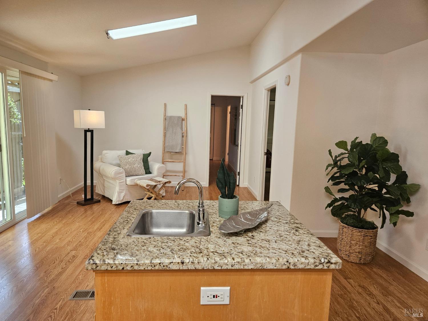 2 San Ardo Court St. Helena, CA 94574 - Photo 11 of 45 a dining room with kitchen island granite countertop furniture and a potted plant