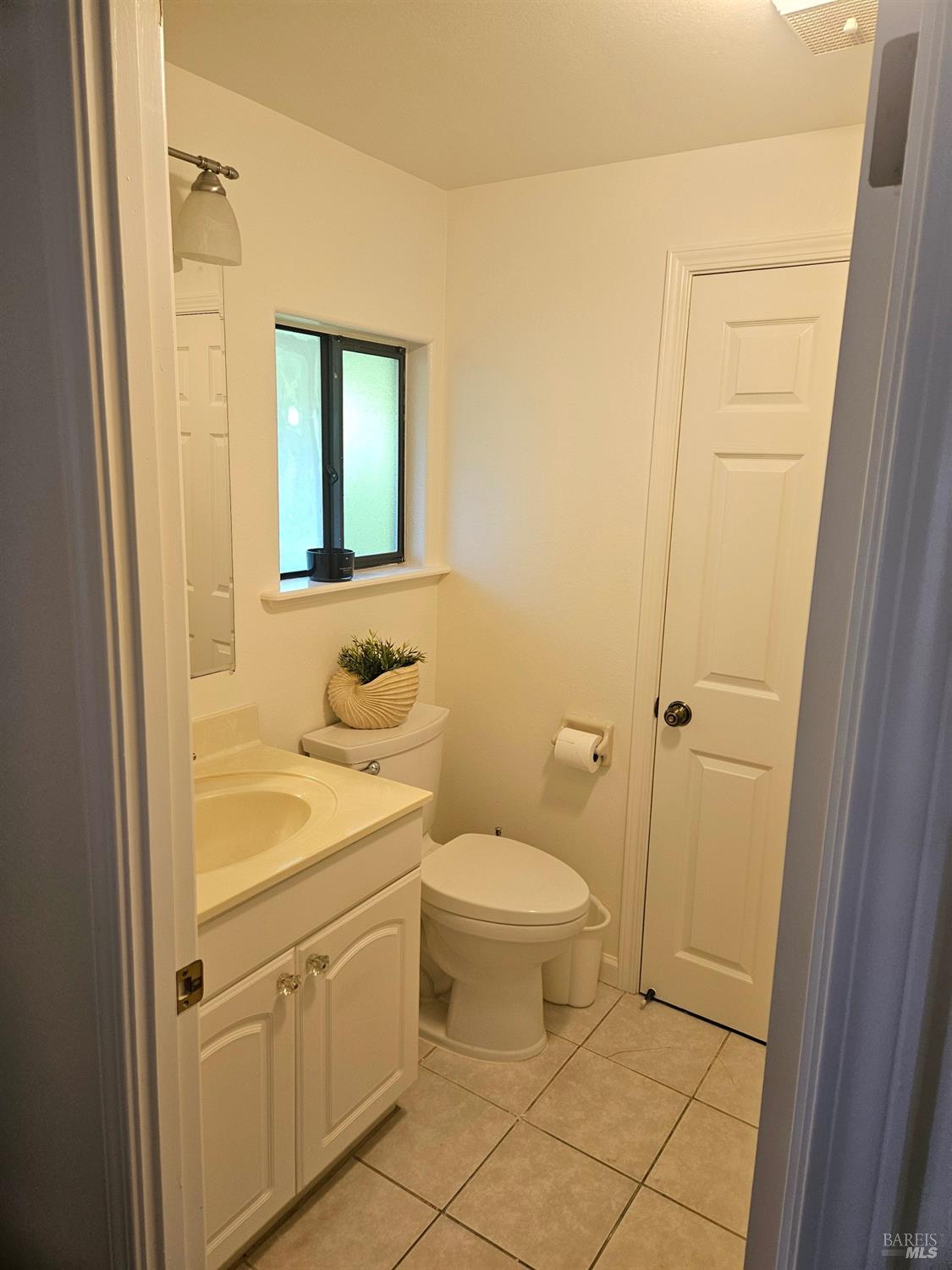 2 San Ardo Court St. Helena, CA 94574 - Photo 18 of 45 a bathroom with a granite countertop sink toilet and shower