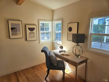 a view of a back yard from a balcony