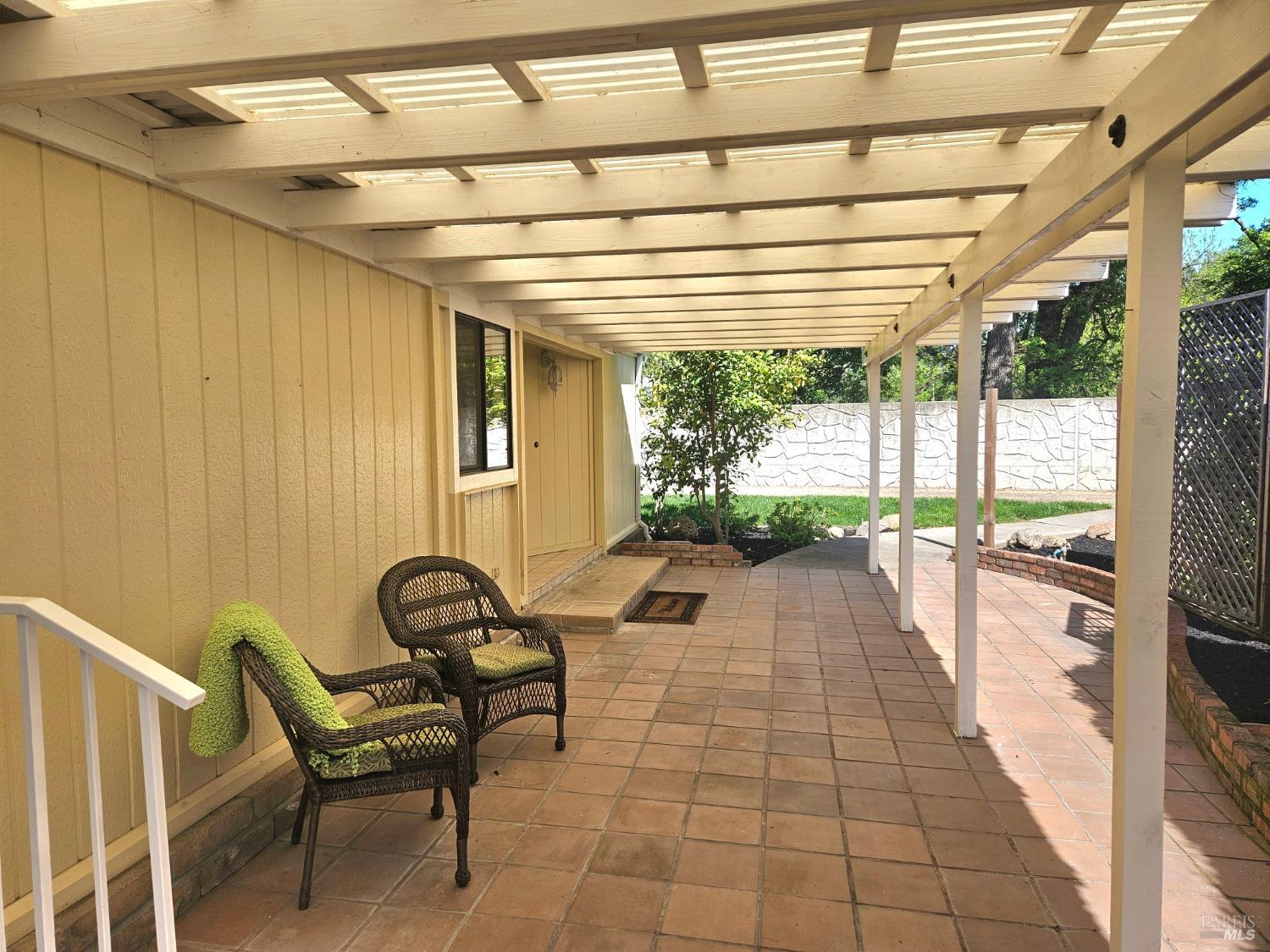 2 San Ardo Court St. Helena, CA 94574 - Photo 29 of 45 a view of a patio with a table and chairs