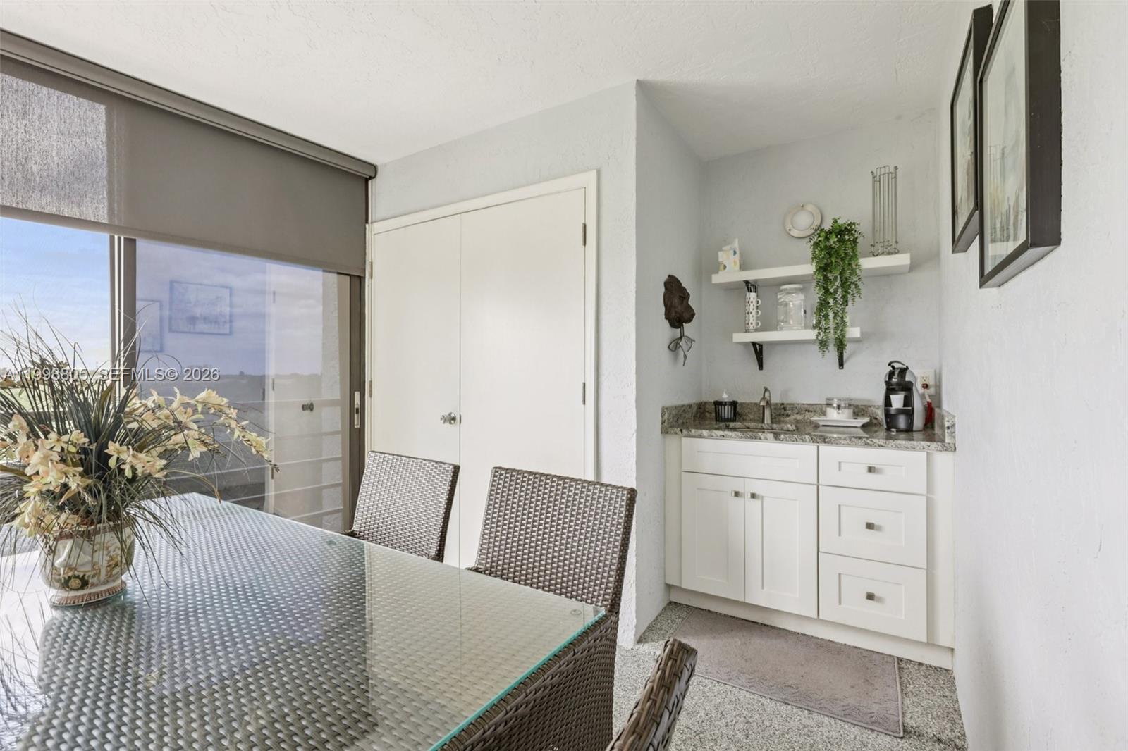 9170 Southwest 14th Street, Unit 4508 Boca Raton, FL 33428 - Photo 15 of 48 a bedroom with a bed and a couch