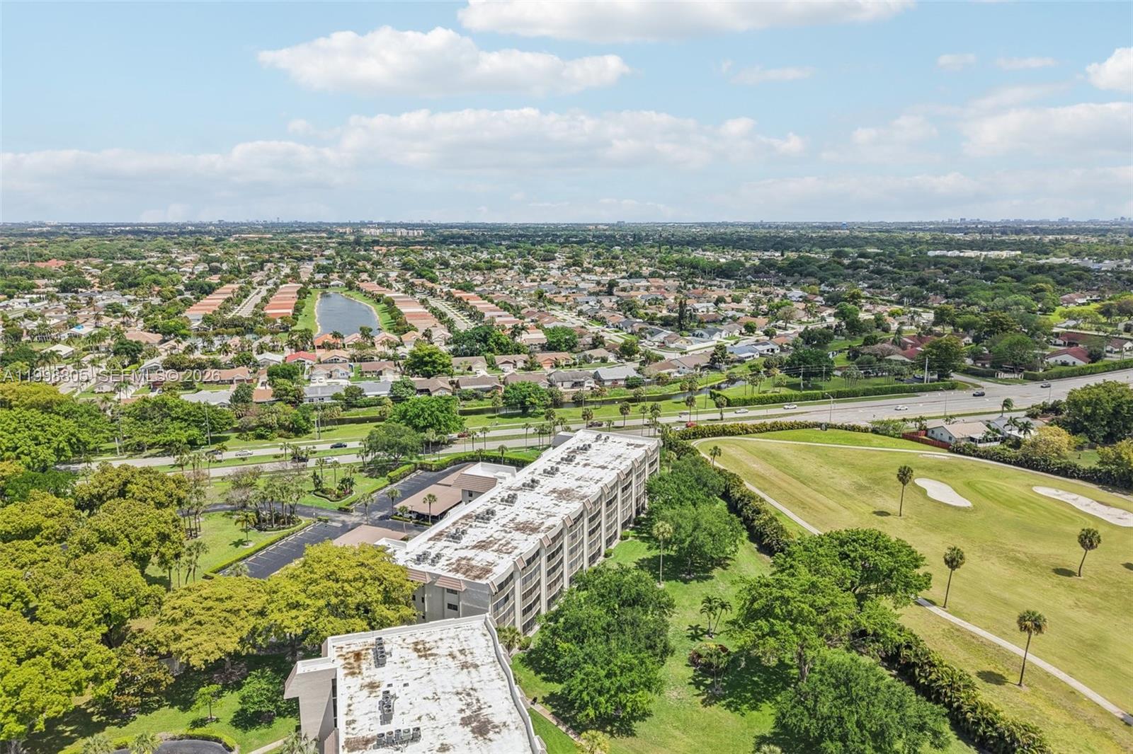 9170 Southwest 14th Street, Unit 4508 Boca Raton, FL 33428 - Photo 46 of 48 an aerial view of residential building and lake