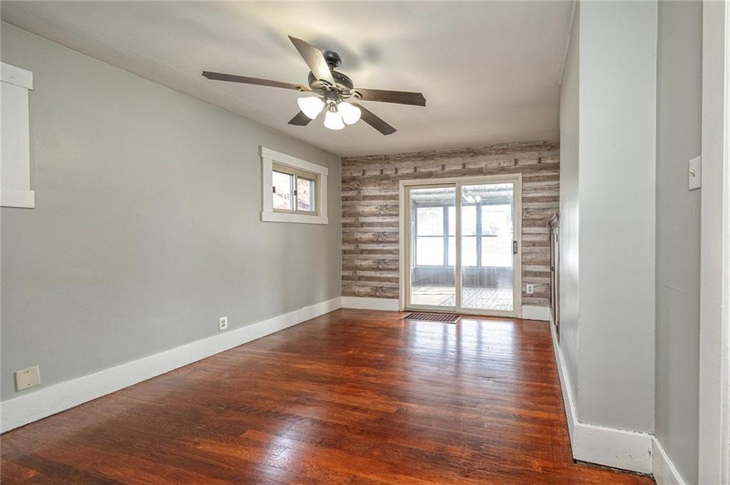 88 Evans Avenue Pittsburgh, PA 15205 - Photo 13 of 41 a view of an empty room with wooden floor and a window