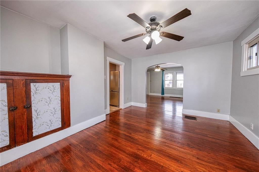 88 Evans Avenue Pittsburgh, PA 15205 - Photo 14 of 41 a view of livingroom with hardwood floor and ceiling fan