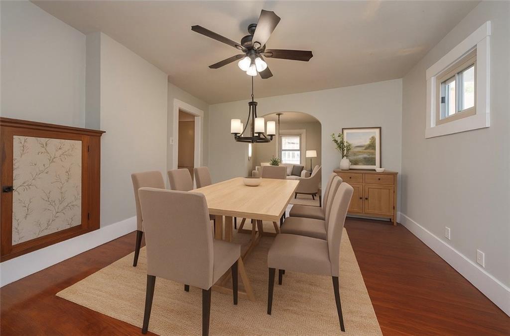 88 Evans Avenue Pittsburgh, PA 15205 - Photo 15 of 41 a dining room with furniture a chandelier and wooden floor