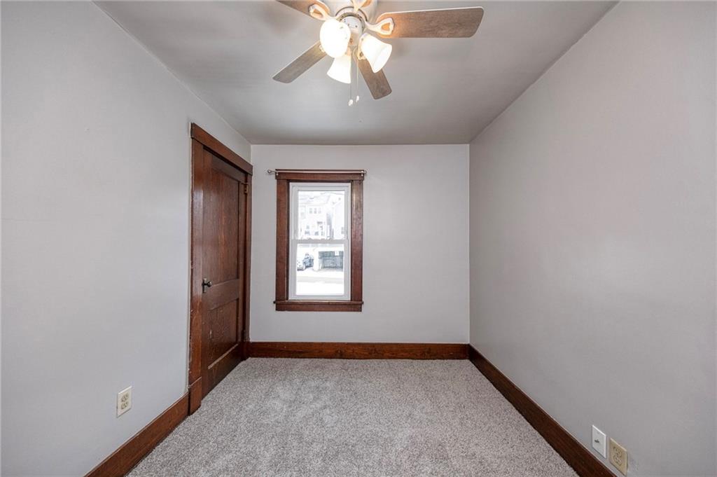 88 Evans Avenue Pittsburgh, PA 15205 - Photo 27 of 41 an empty room with windows and fan