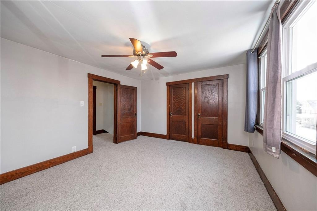 88 Evans Avenue Pittsburgh, PA 15205 - Photo 32 of 41 an empty room with windows and fan