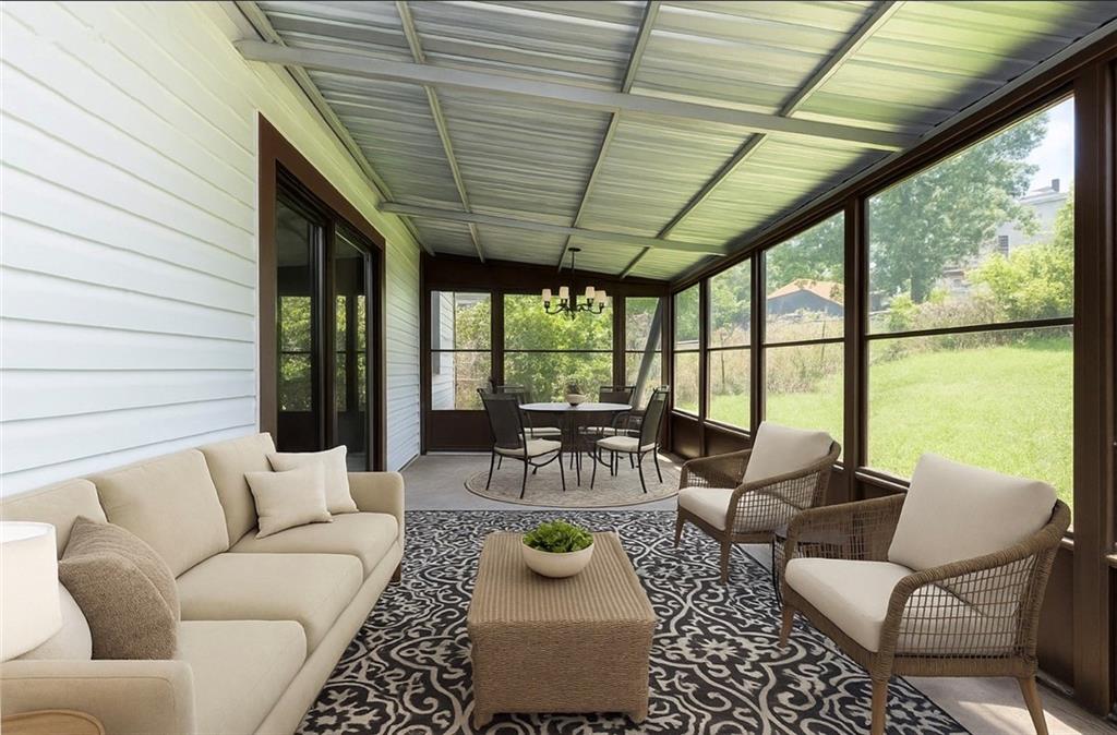 88 Evans Avenue Pittsburgh, PA 15205 - Photo 35 of 41 a living room with furniture and a large window