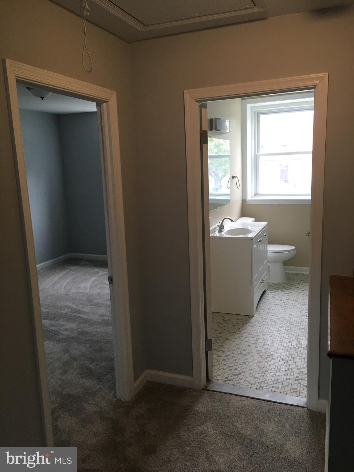 5254 Darien Road Baltimore, MD 21206 - Photo 7 of 11 Hallway / Bedroom / Bath
