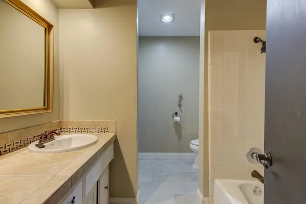 a bathroom with a sink and a tub