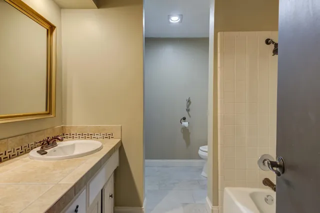 a bathroom with a sink and a tub