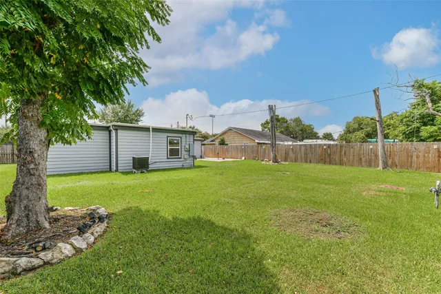 a view of a backyard with a garden