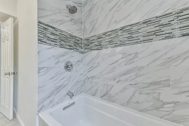 a bathroom with a bathtub