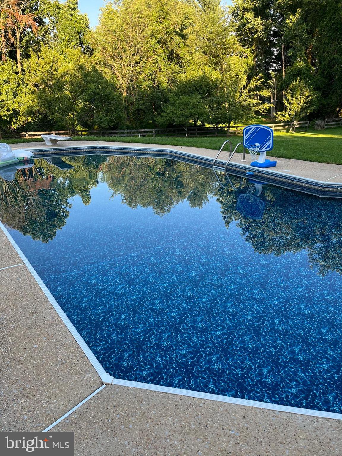 13215 Falls Road Cockeysville, MD 21030 - Photo 30 of 40 a view of swimming pool with a yard