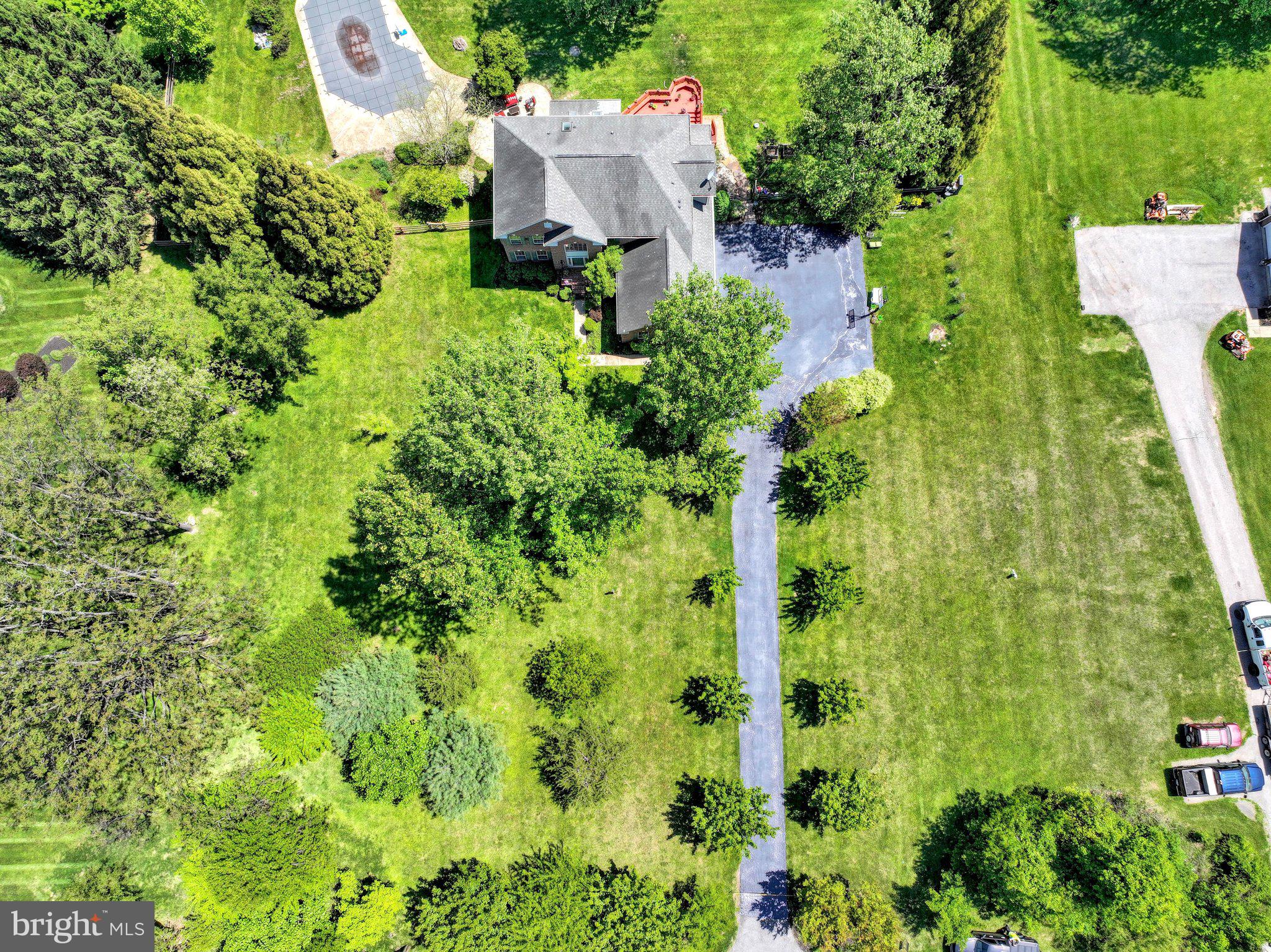13215 Falls Road Cockeysville, MD 21030 - Photo 33 of 40 an aerial view of a house with a yard