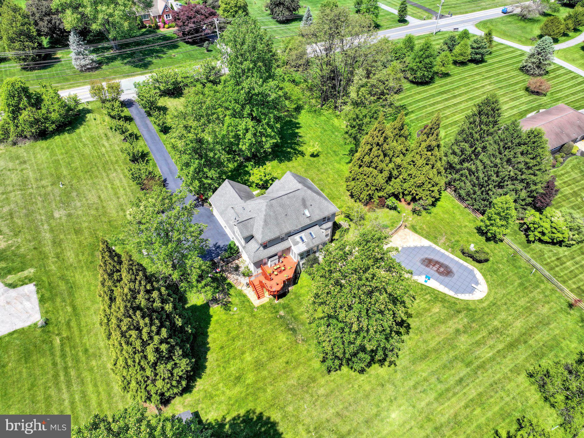 13215 Falls Road Cockeysville, MD 21030 - Photo 34 of 40 an aerial view of residential house with outdoor space and trees all around